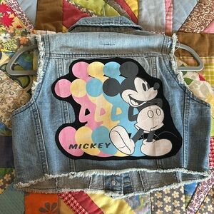 A FroggyBottomDesign denim vest.